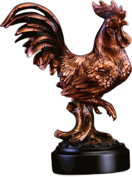 The Golden Cock. A bronzed rooster trophy on a polished black base